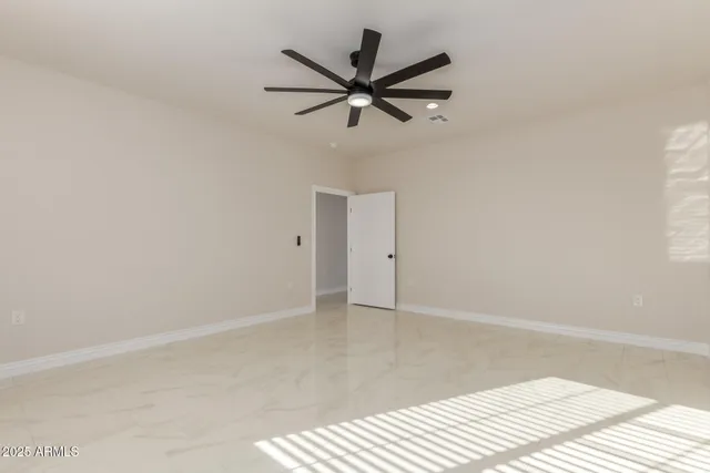 a bathroom with a double vanity sink mirror and shower