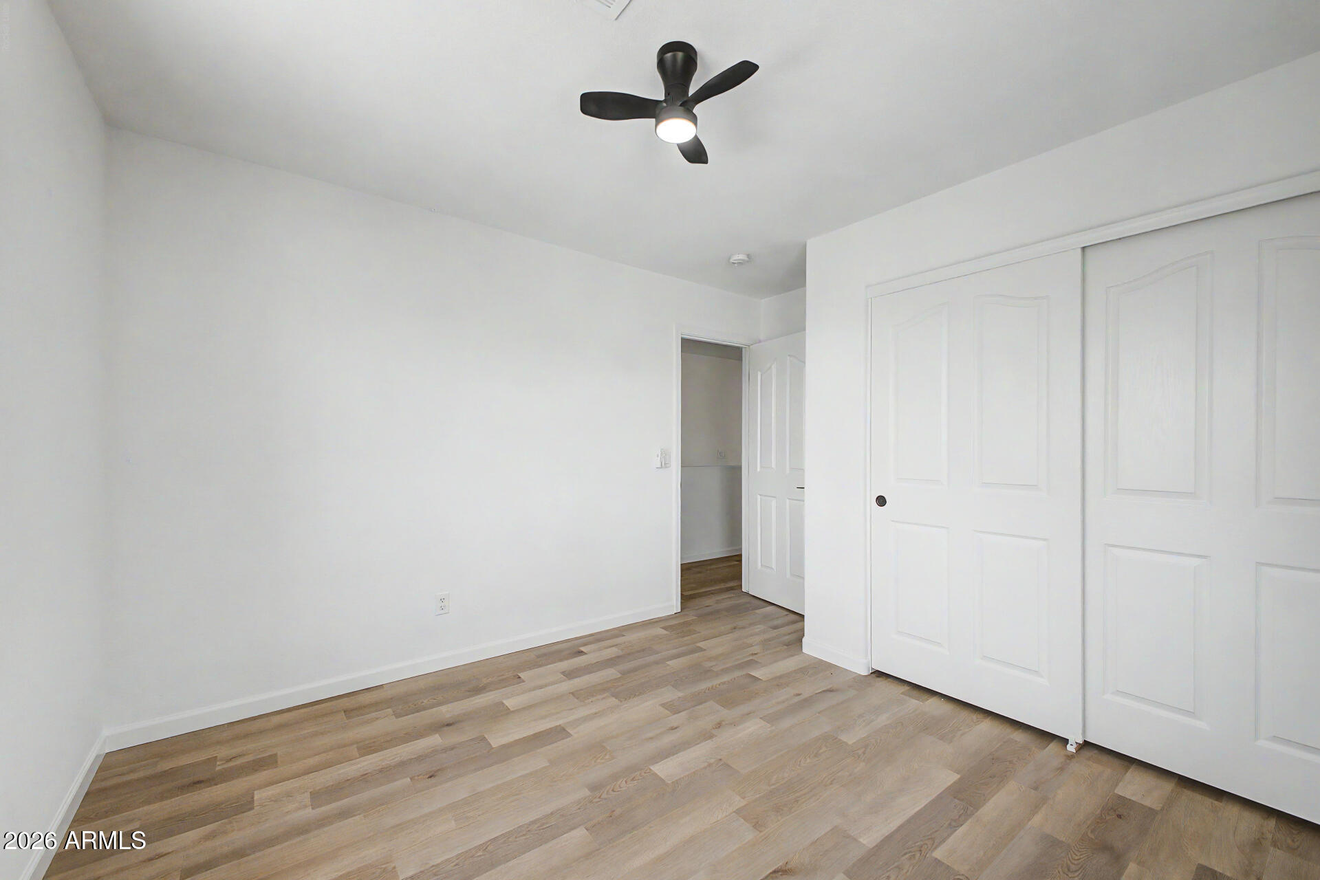 6452 West Ruth Avenue Glendale, AZ 85302 - Photo 31 of 35 a view of empty room with ceiling fan