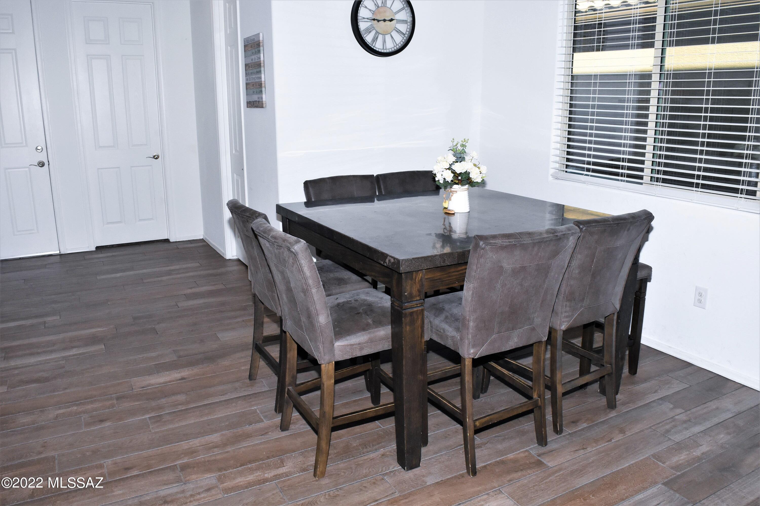 21295 East Treasure Road Red Rock, AZ 85145 - Photo 5 of 34 a dining room with furniture and window