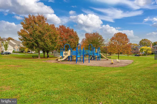 a view of swimming pool with seating space