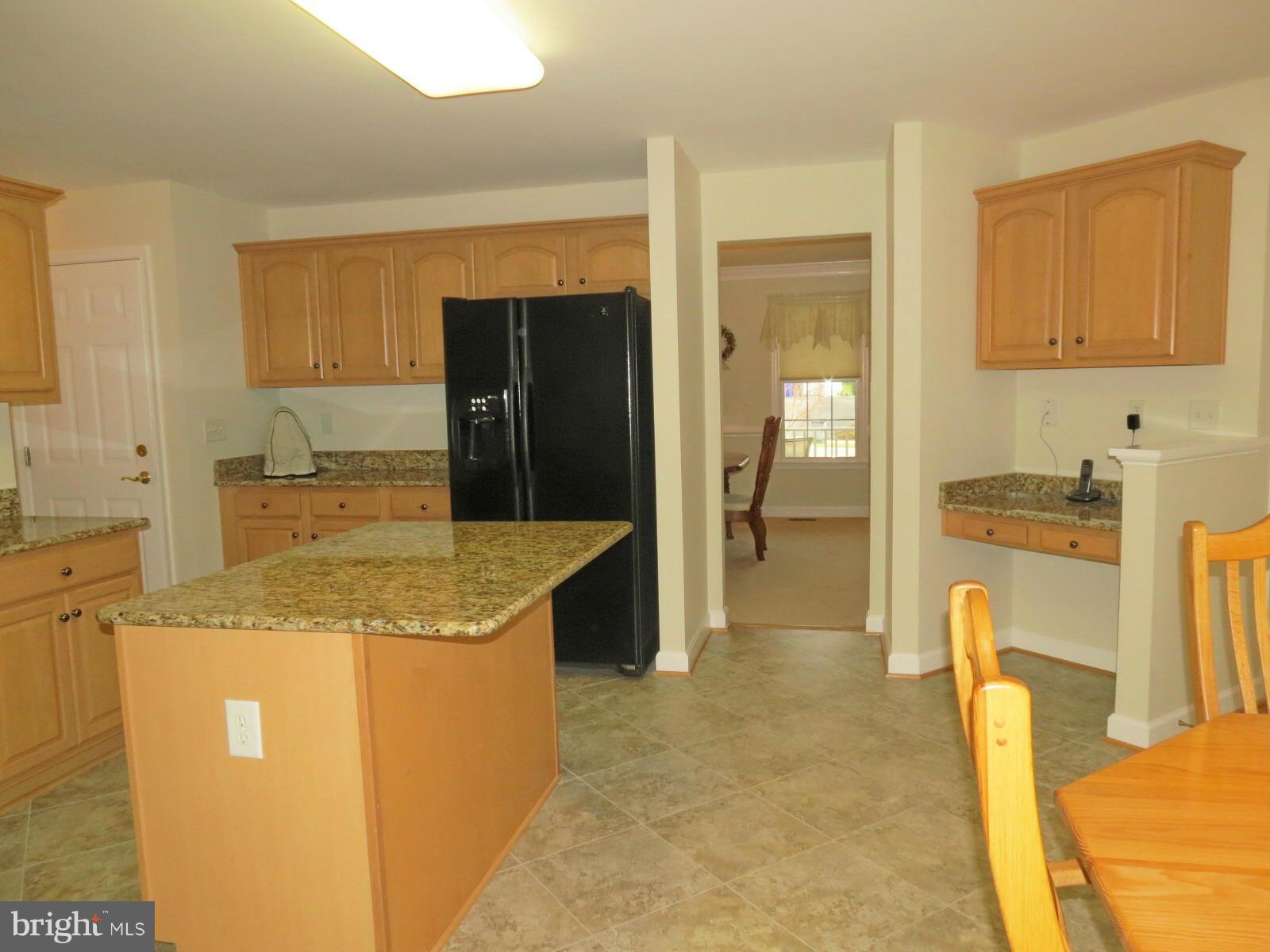 809 Longbow Road Mount Airy, MD 21771 - Photo 18 of 30 Kitchen opens to Dining Room