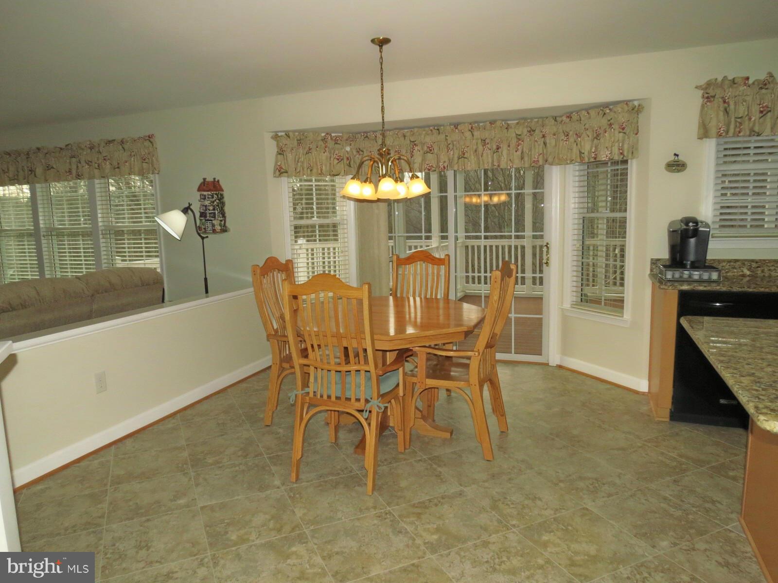 809 Longbow Road Mount Airy, MD 21771 - Photo 19 of 30 Kitchen has Slider to Screened Porch