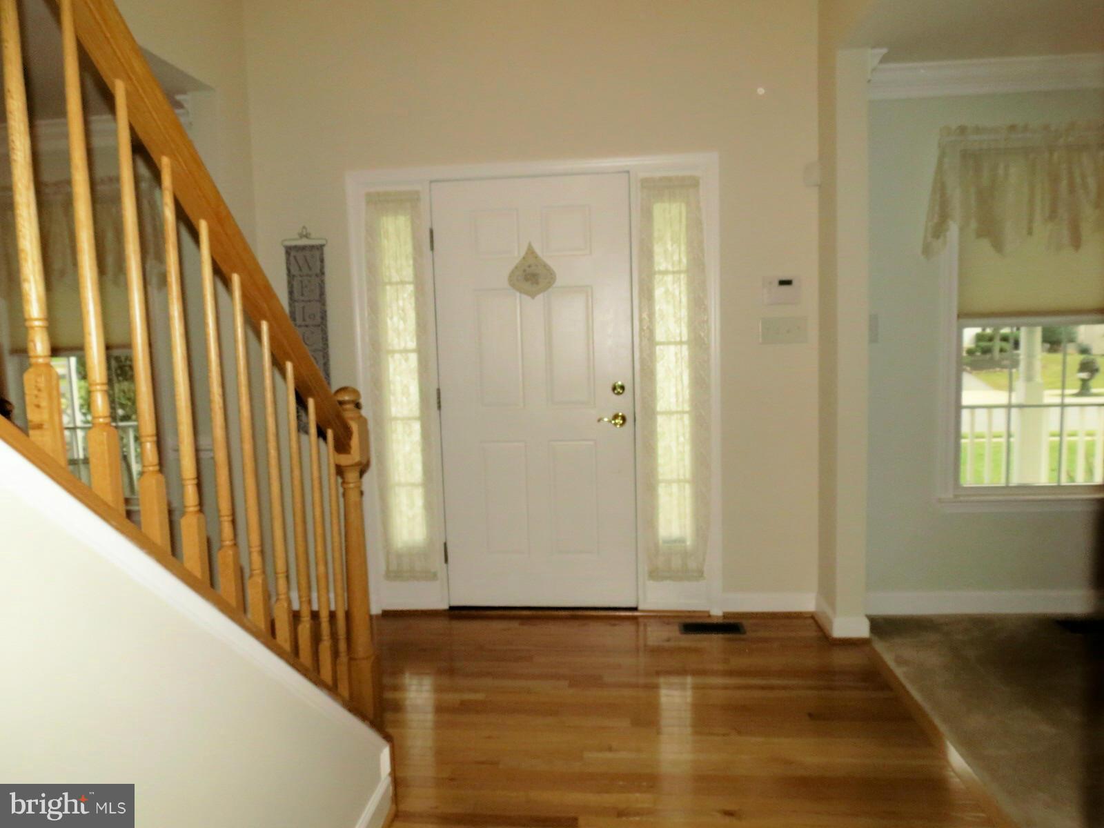 809 Longbow Road Mount Airy, MD 21771 - Photo 8 of 30 Foyer has Gleaming Hardwood Floors