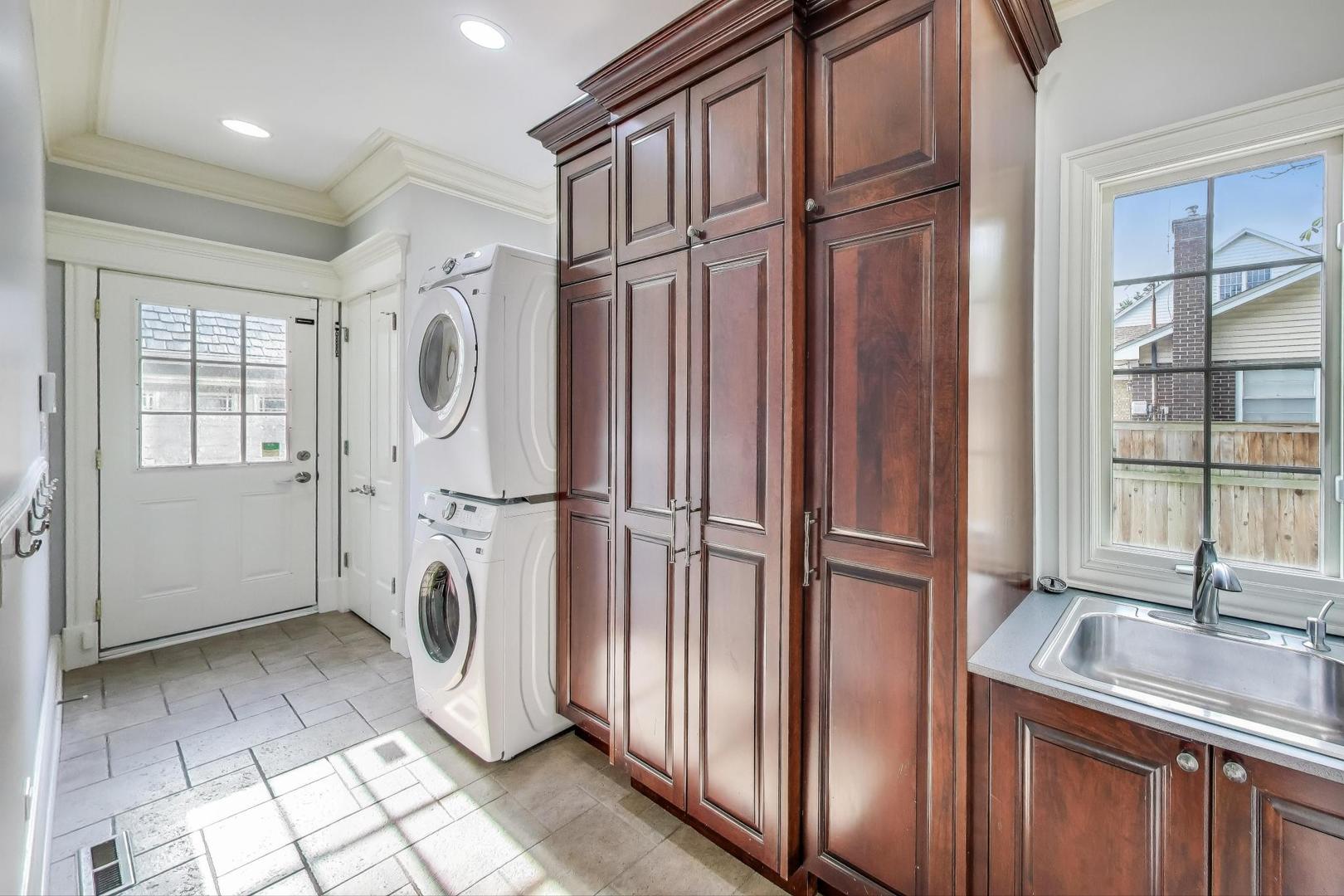 621 North County Line Road Hinsdale, IL 60521 - Photo 22 of 59 a view of a kitchen with a sink