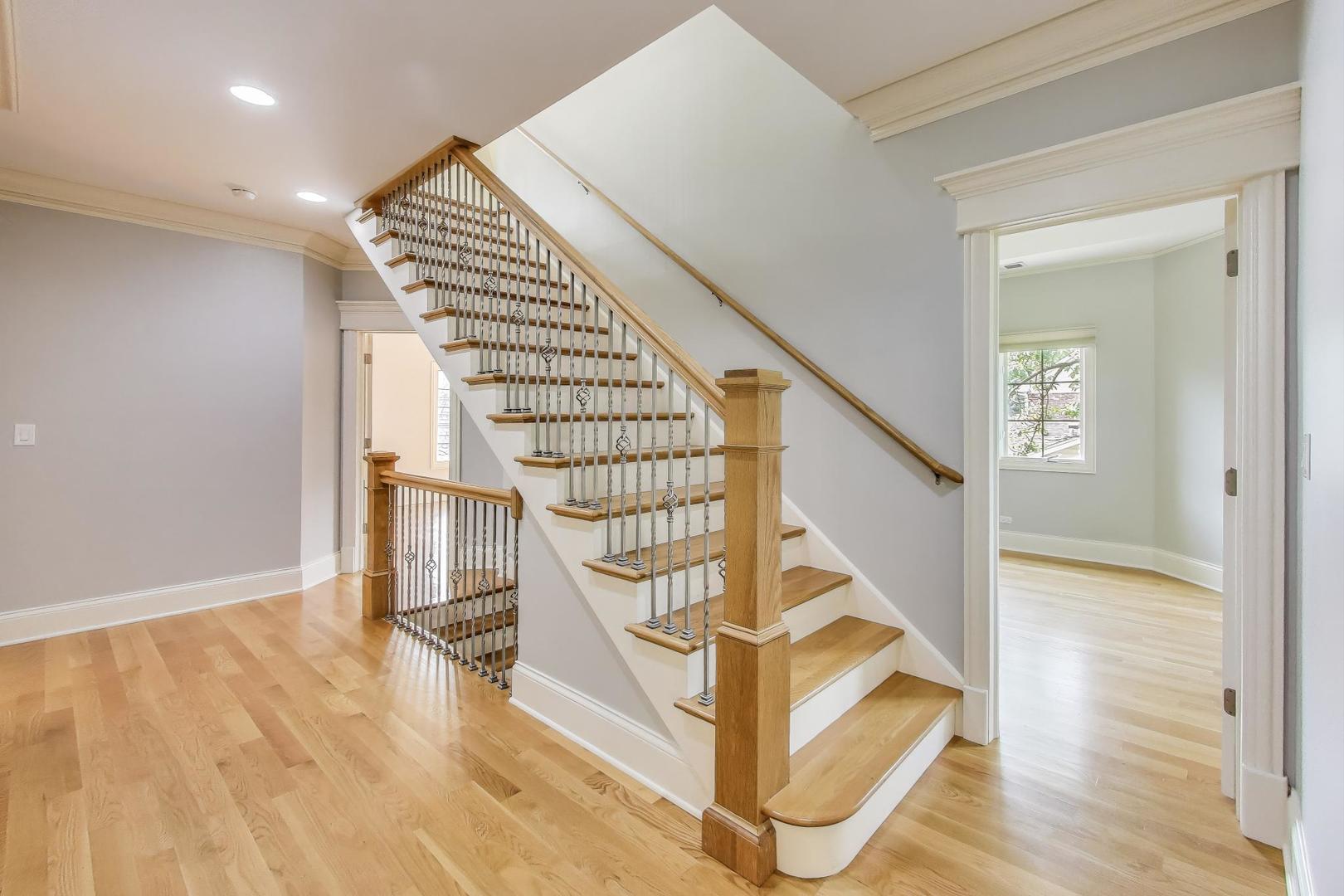 621 North County Line Road Hinsdale, IL 60521 - Photo 23 of 59 a view of entryway and hall with wooden floor
