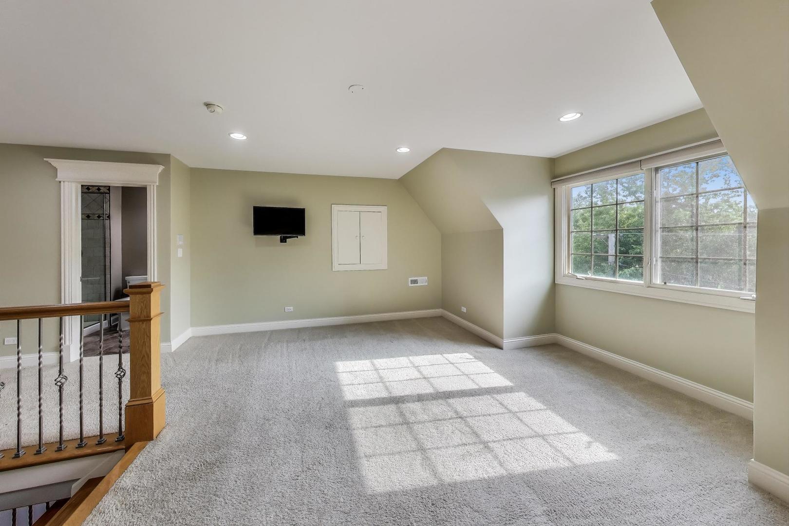 621 North County Line Road Hinsdale, IL 60521 - Photo 47 of 59 a view of an empty room with a window