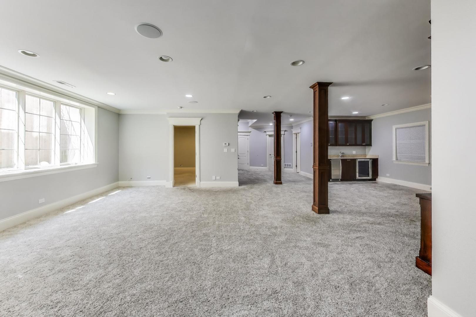 621 North County Line Road Hinsdale, IL 60521 - Photo 49 of 59 a view of an empty room with a window