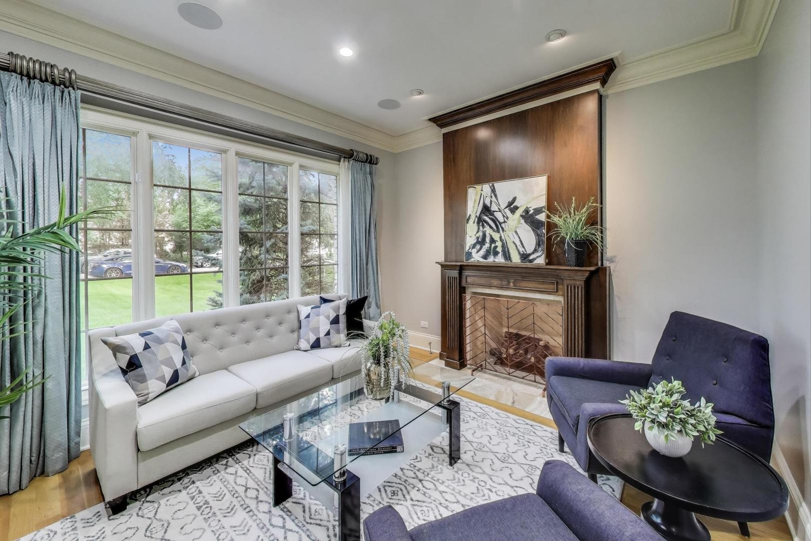 621 North County Line Road Hinsdale, IL 60521 - Photo 6 of 59 a living room with furniture and a large window
