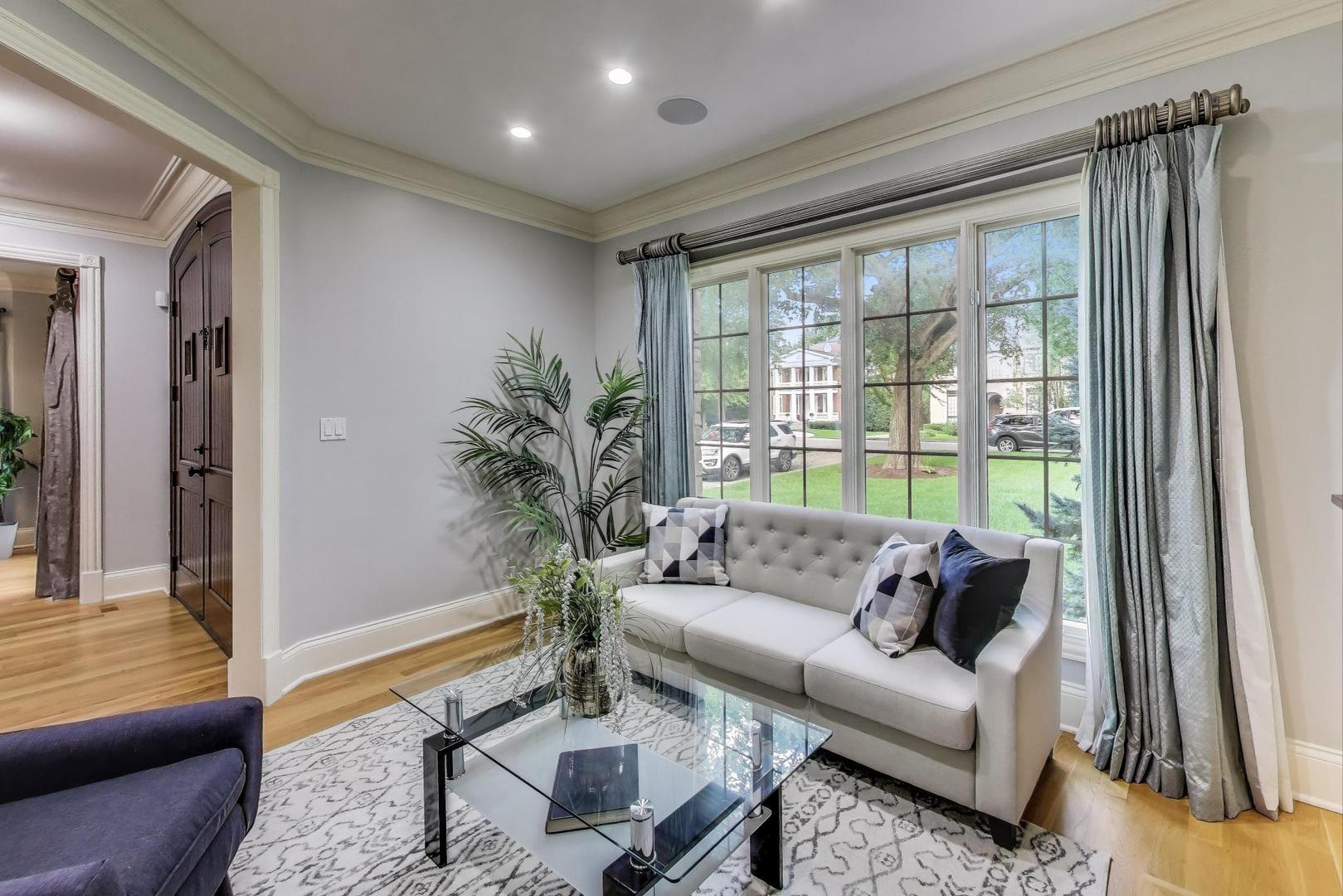 621 North County Line Road Hinsdale, IL 60521 - Photo 7 of 59 a living room with furniture and a large window