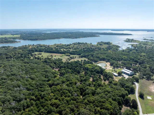 an aerial view of multiple house and outdoor space