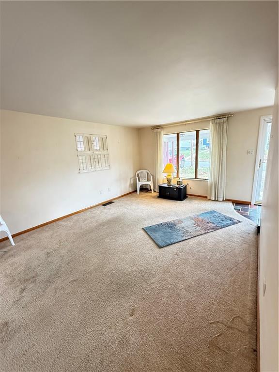 432 Violet Drive Lower Burrell, PA 15068 - Photo 12 of 42 a view of a room with a bed and a large window