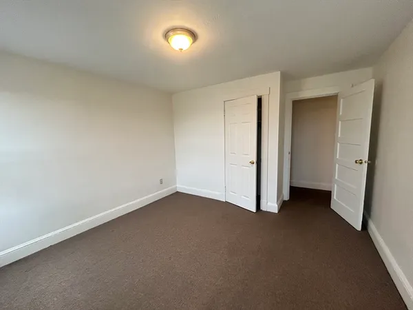 an empty room with a natural light