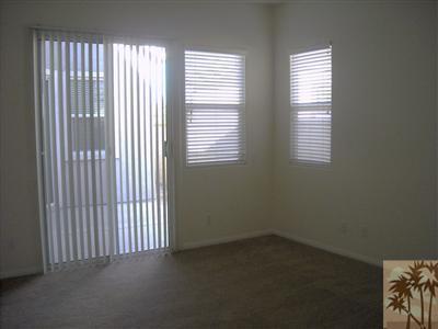 49829 Wayne Street Indio, CA 92201 - Photo 17 of 24 an empty room with windows