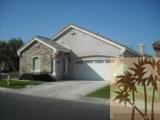 49829 Wayne Street Indio, CA 92201 - Photo 21 of 24 a view of a house with a yard