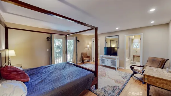 a living room with a couch and a rug