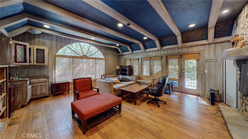 1248 Rocky Road Simi Valley, CA 93063 - Photo 16 of 71 a living room with furniture and a wooden floor