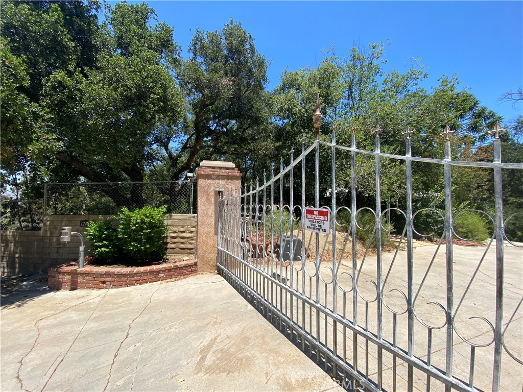 1248 Rocky Road Simi Valley, CA 93063 - Photo 38 of 55 a view of a wrought iron fences in front of house