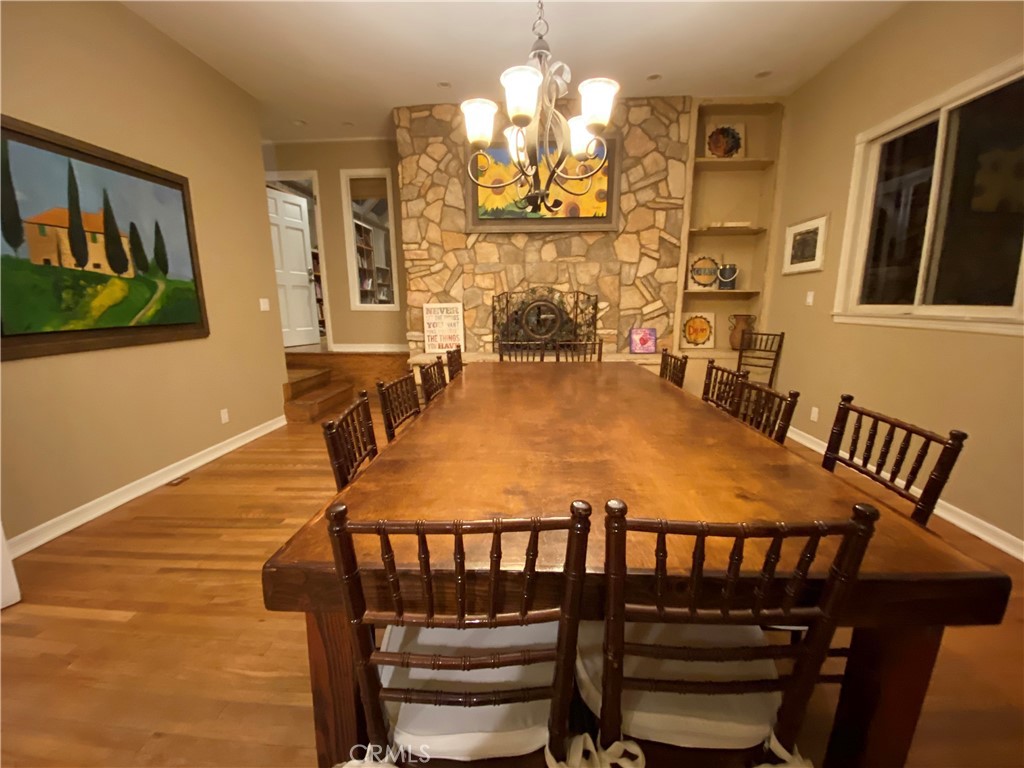 1248 Rocky Road Simi Valley, CA 93063 - Photo 44 of 71 a dining room with furniture window and wooden floor
