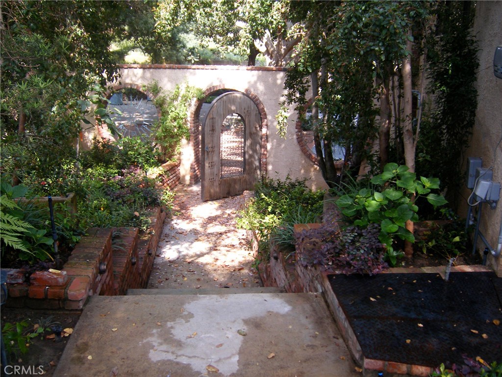 1248 Rocky Road Simi Valley, CA 93063 - Photo 46 of 55 a front view of a house with a yard