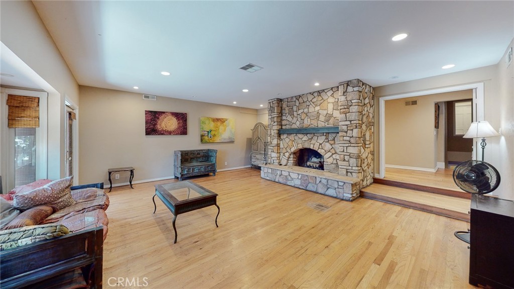 1248 Rocky Road Simi Valley, CA 93063 - Photo 8 of 71 a living room with furniture and a fireplace
