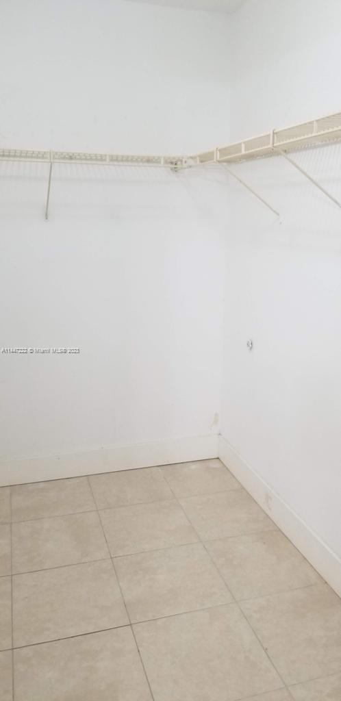 5790 Stirling Road, Unit 205 Hollywood, FL 33021 - Photo 25 of 28 a view of small space with racks on the wall