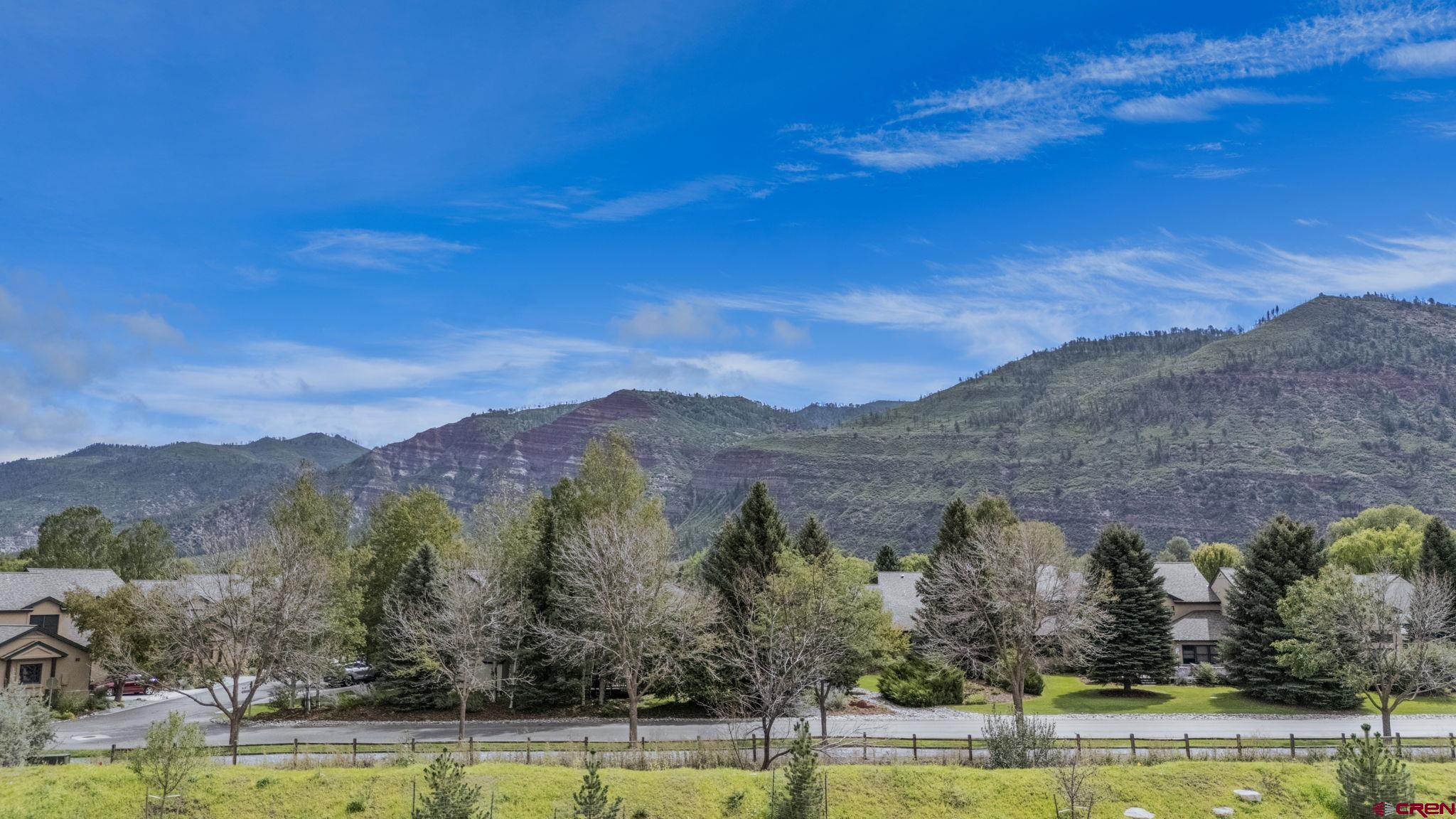 260 West Dalton Road Durango, CO 81301 - Photo 8 of 9 a view of a lake with mountains in the background