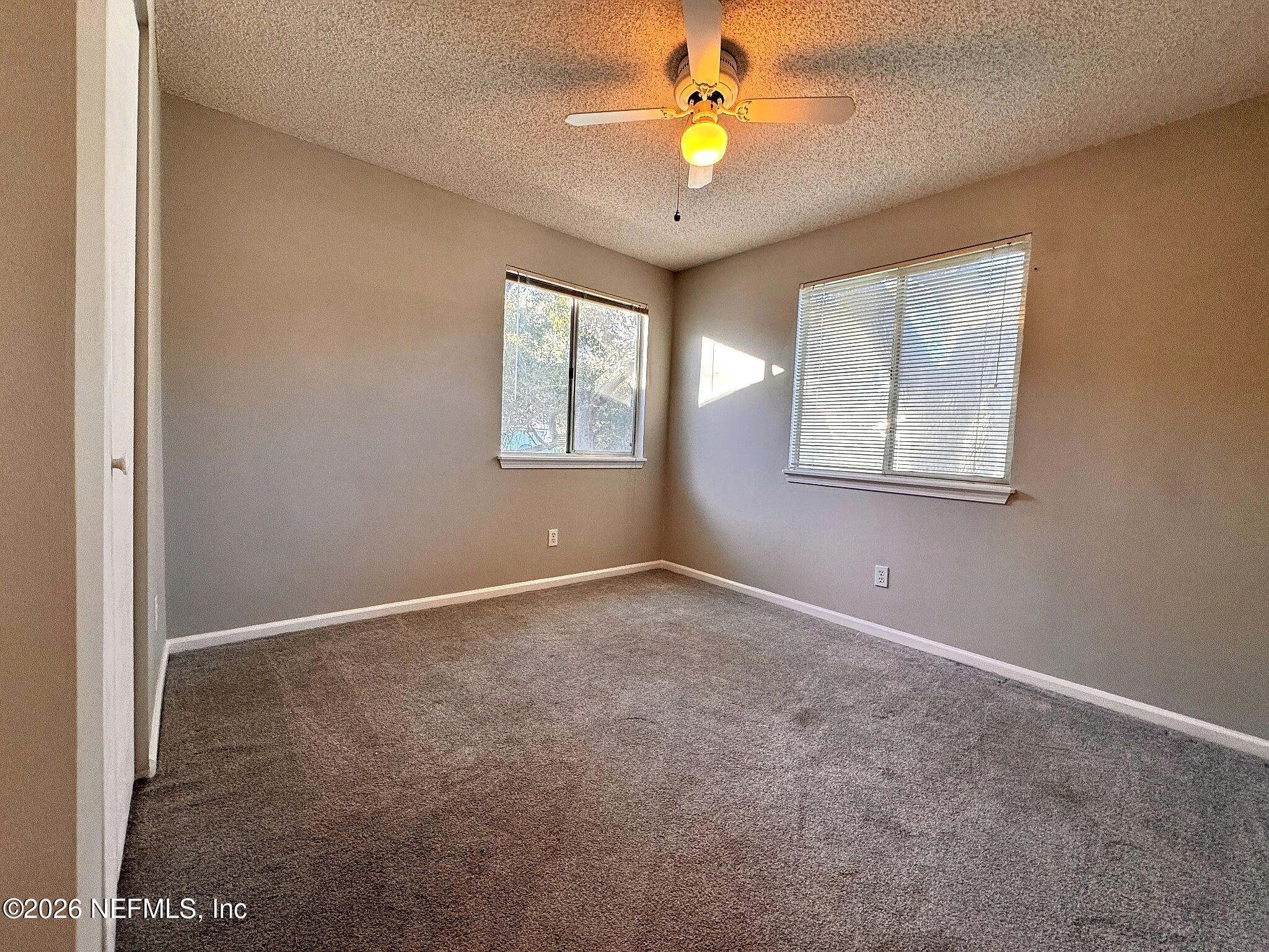 3270 Ricky Drive, Unit 302 Jacksonville, FL 32223 - Photo 8 of 12 07_Second_Bedroom.jpg