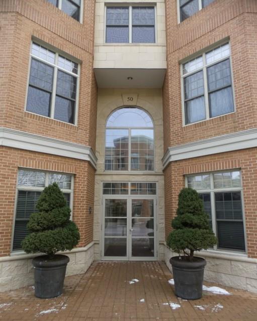 50 Stone Ridge Way, Unit 3B Fairfield, CT 06824 - Photo 1 of 1 a view of a building with a window