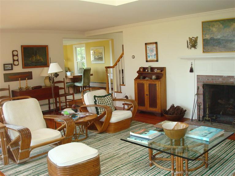 74 Sears Point Road Chatham, MA 02633 - Photo 15 of 16 a living room with furniture and a fireplace