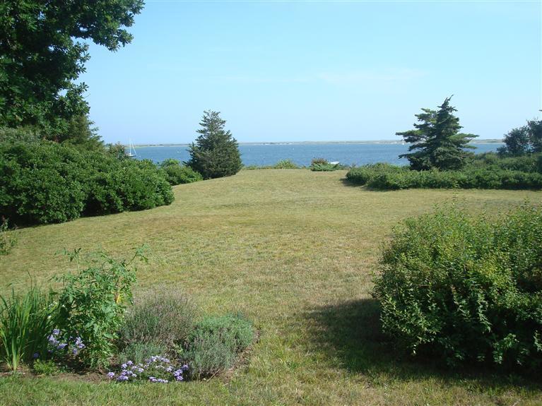 74 Sears Point Road Chatham, MA 02633 - Photo 4 of 16 a view of a field with an ocean view