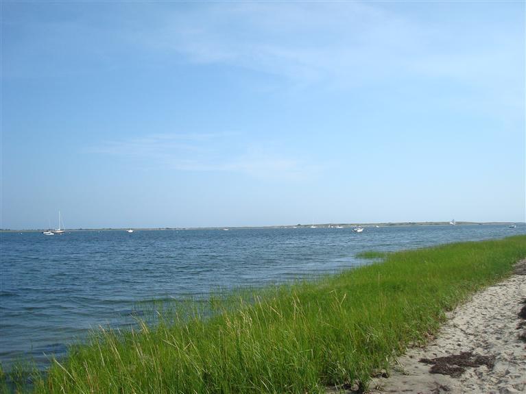74 Sears Point Road Chatham, MA 02633 - Photo 8 of 16 a view of an ocean and beach