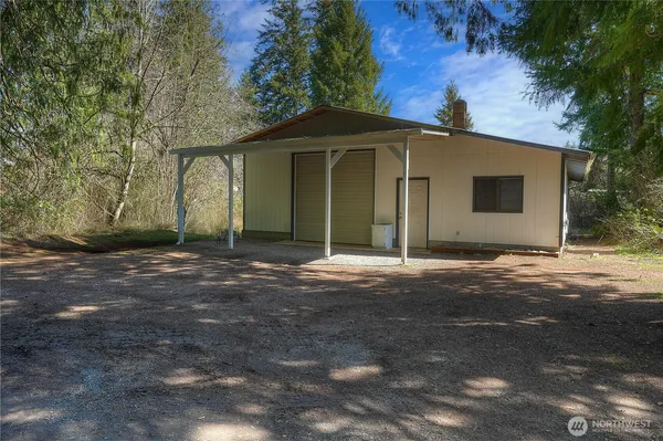 a front view of a house with a garage