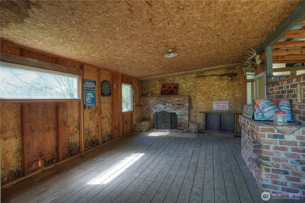 a view of livingroom with furniture and fire place