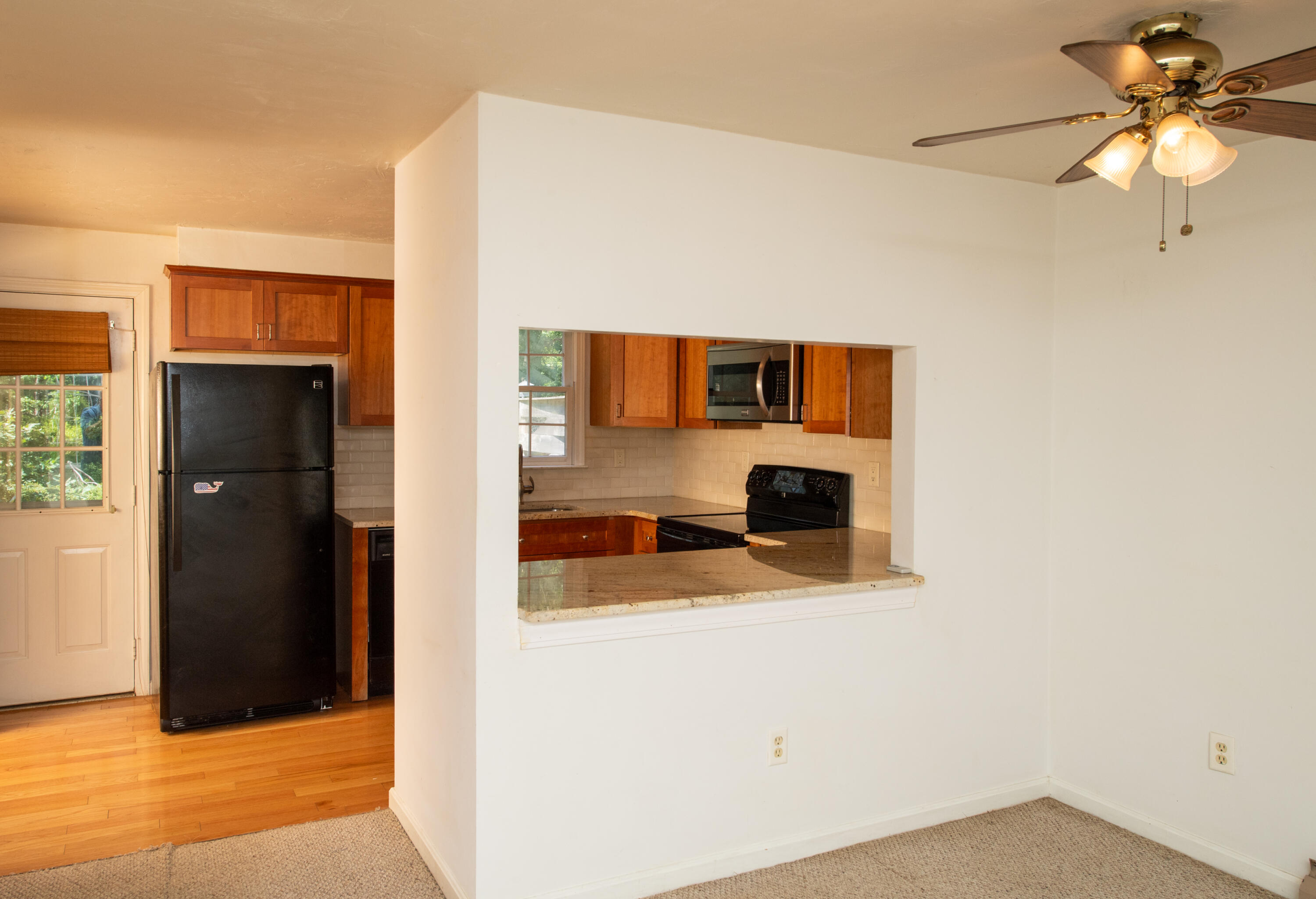 248 Camp Street, Unit M5 West Yarmouth, MA 02673 - Photo 3 of 12 a bathroom with a sink and a mirror