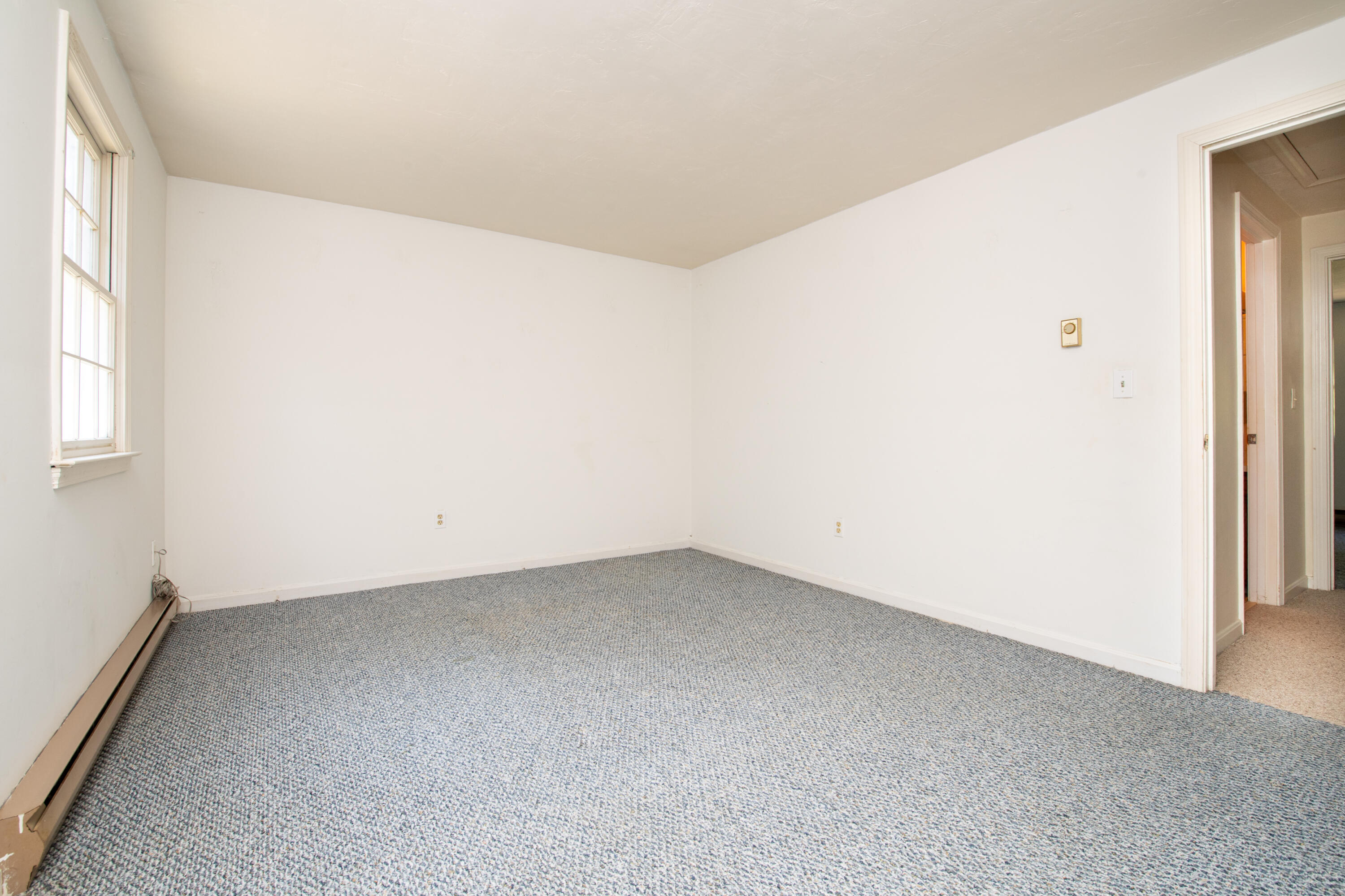 248 Camp Street, Unit M5 West Yarmouth, MA 02673 - Photo 6 of 12 an empty room with a window