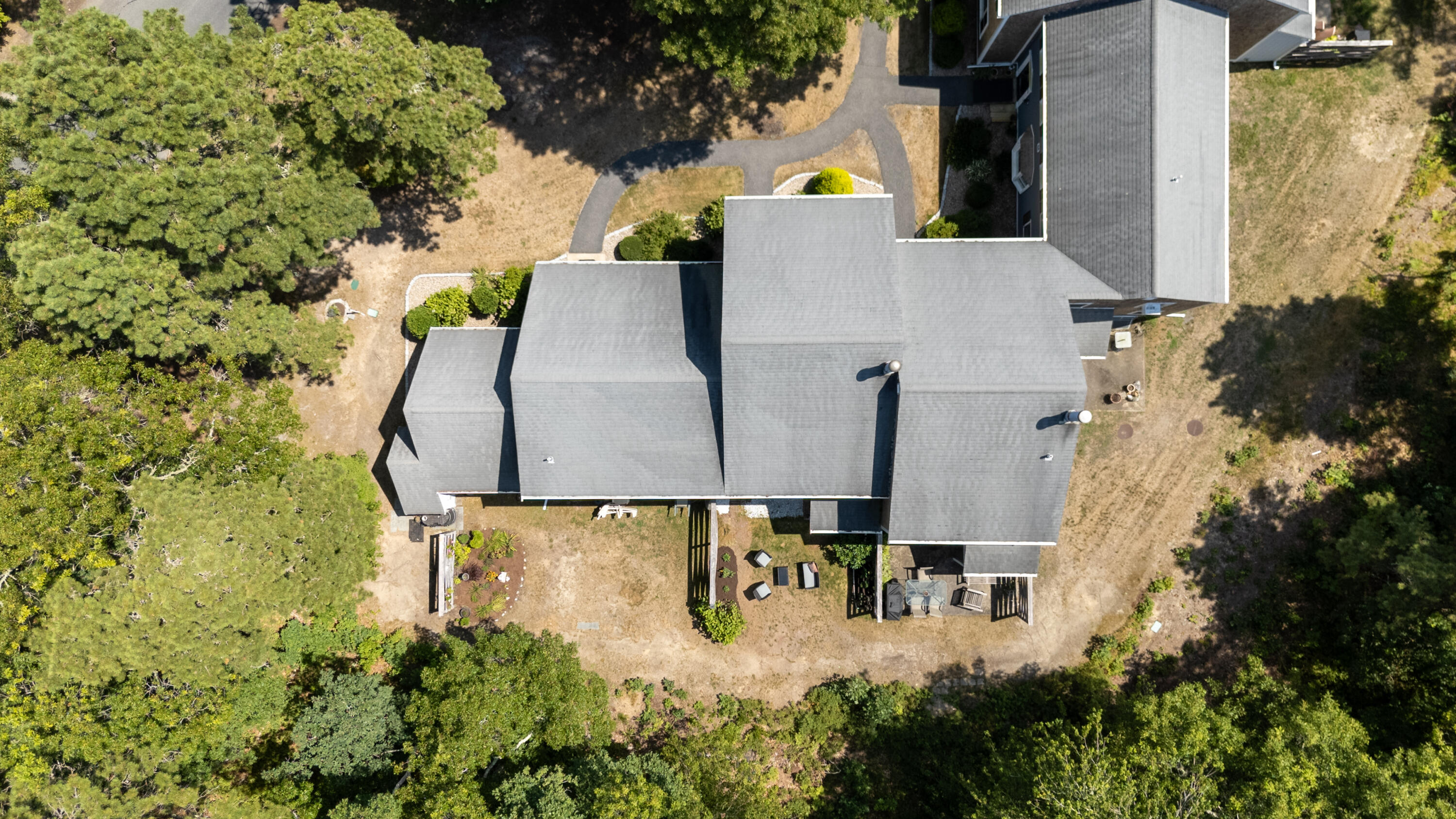 248 Camp Street, Unit M5 West Yarmouth, MA 02673 - Photo 9 of 12 an aerial view of a house with outdoor space and swimming pool