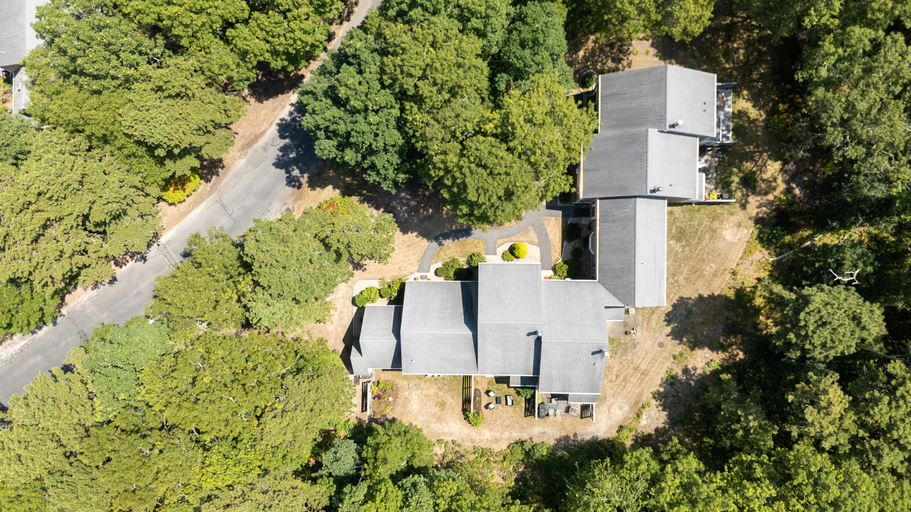 248 Camp Street, Unit M5 West Yarmouth, MA 02673 - Photo 10 of 12 an aerial view of residential house with outdoor space and trees all around
