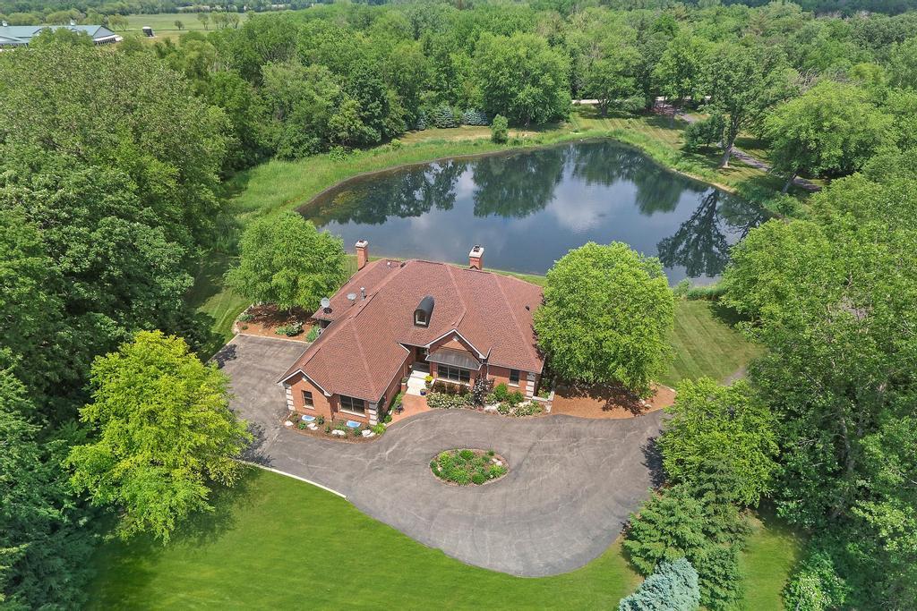 385 Spring Creek Road Barrington Hills, IL 60010 - Photo 1 of 53 an aerial view of a swimming pool with a yard