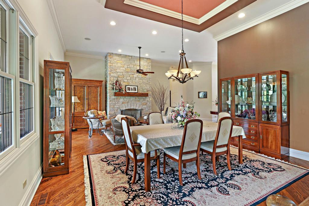 385 Spring Creek Road Barrington Hills, IL 60010 - Photo 14 of 53 a view of a dining room with furniture