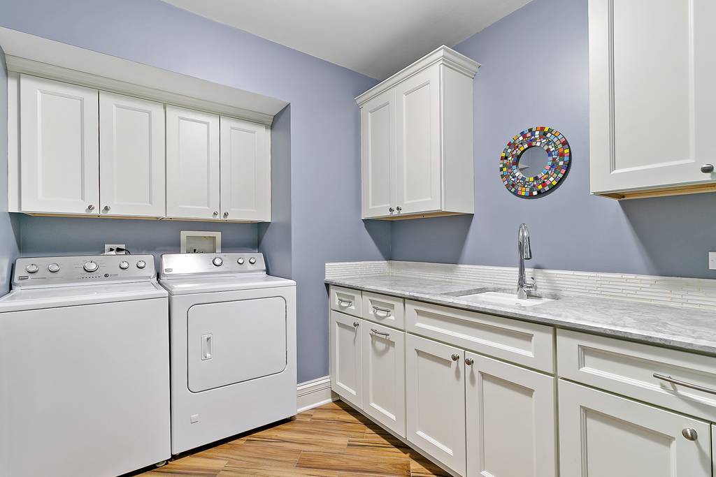 385 Spring Creek Road Barrington Hills, IL 60010 - Photo 46 of 53 a utility room with dryer and washer