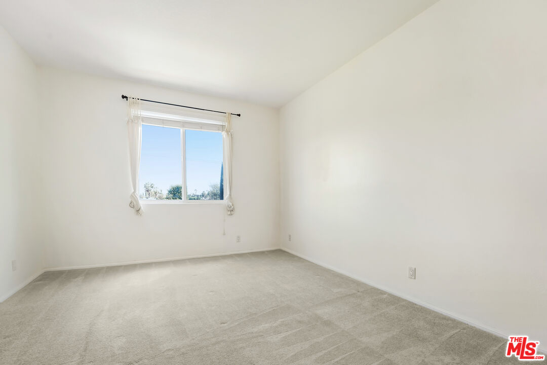 5430 Bellingham Avenue, Unit 306 Valley Village, CA 91607 - Photo 18 of 23 a view of an empty room and window