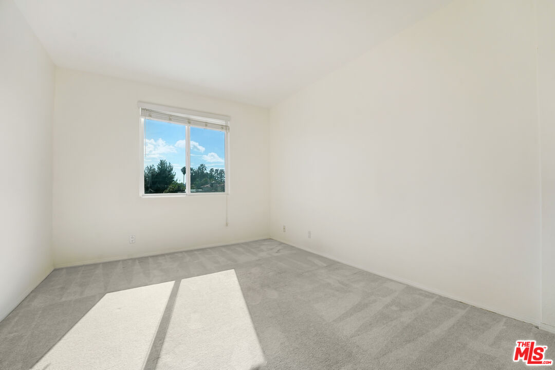 5430 Bellingham Avenue, Unit 306 Valley Village, CA 91607 - Photo 19 of 23 an empty room with a window