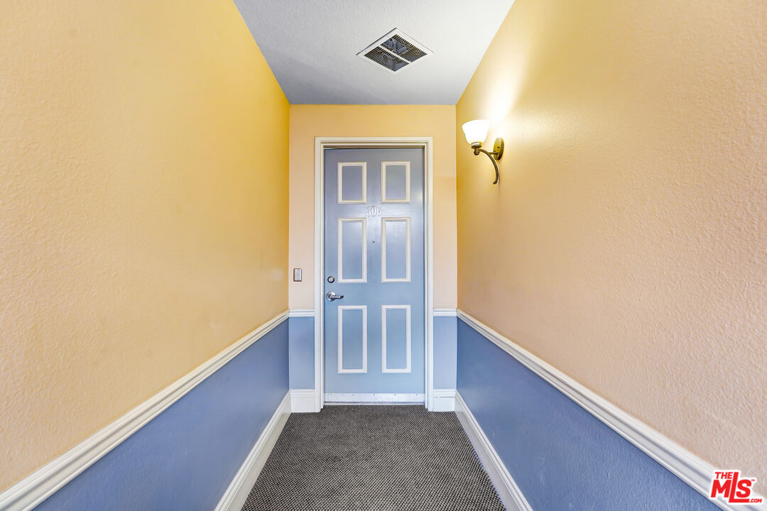 5430 Bellingham Avenue, Unit 306 Valley Village, CA 91607 - Photo 20 of 23 a view of hallway with livingroom
