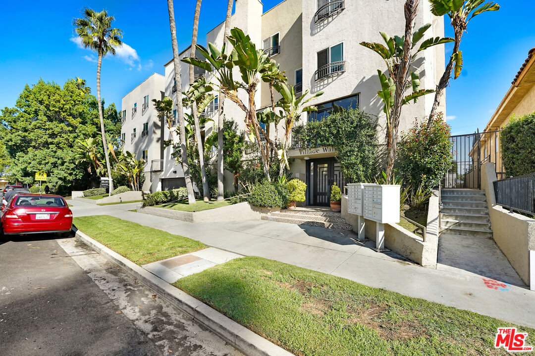 5430 Bellingham Avenue, Unit 306 Valley Village, CA 91607 - Photo 21 of 23 a view of yard with large trees