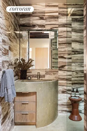 a bathroom with a bathtub and shower