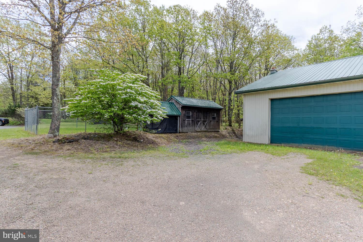 7869 Drane Highway West Decatur, PA 16878 - Photo 42 of 66 a view of a yard with garage
