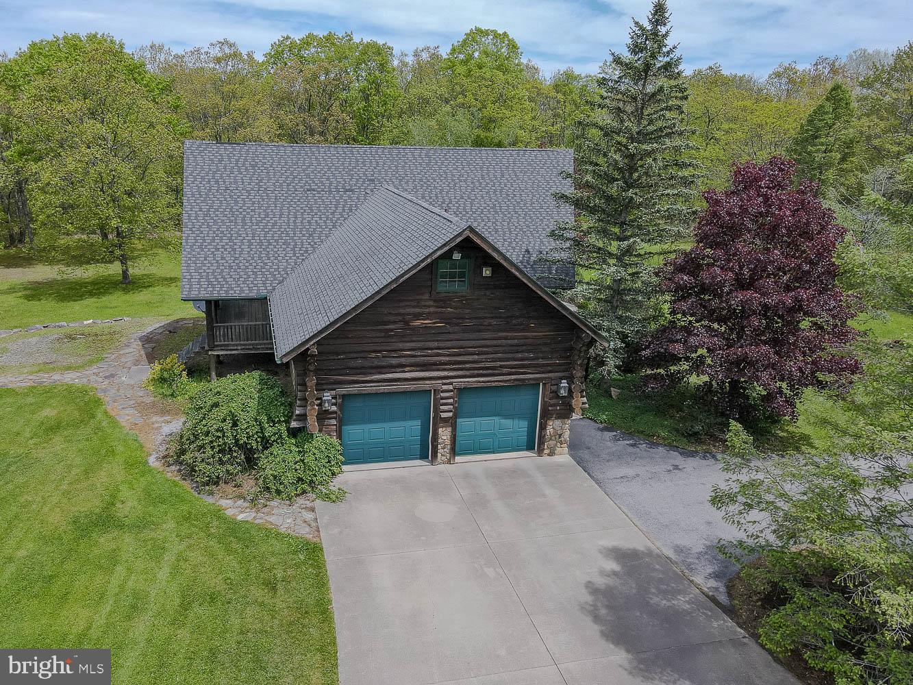 7869 Drane Highway West Decatur, PA 16878 - Photo 50 of 66 a house with trees in the background
