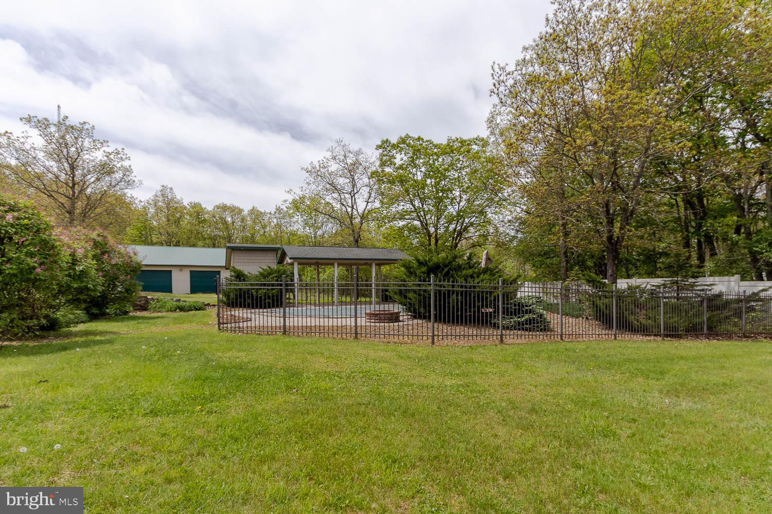 7869 Drane Highway West Decatur, PA 16878 - Photo 60 of 66 a view of a house with a yard and sitting area