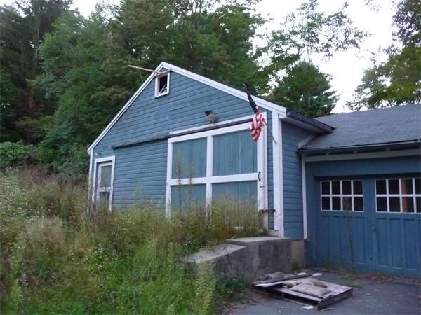 38 Greenwich Plains Road Ware, MA 01082 - Photo 4 of 21 a front view of a house with a yard