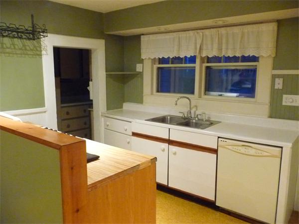 38 Greenwich Plains Road Ware, MA 01082 - Photo 7 of 21 a kitchen with a sink and a refrigerator